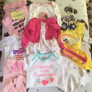 Set of girls baby clothes and accessories